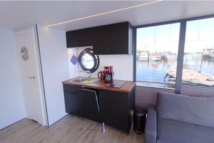 Hausboot Fjord Aries Mit Dachterrasse In Schleswig Hotel Buitenkant foto